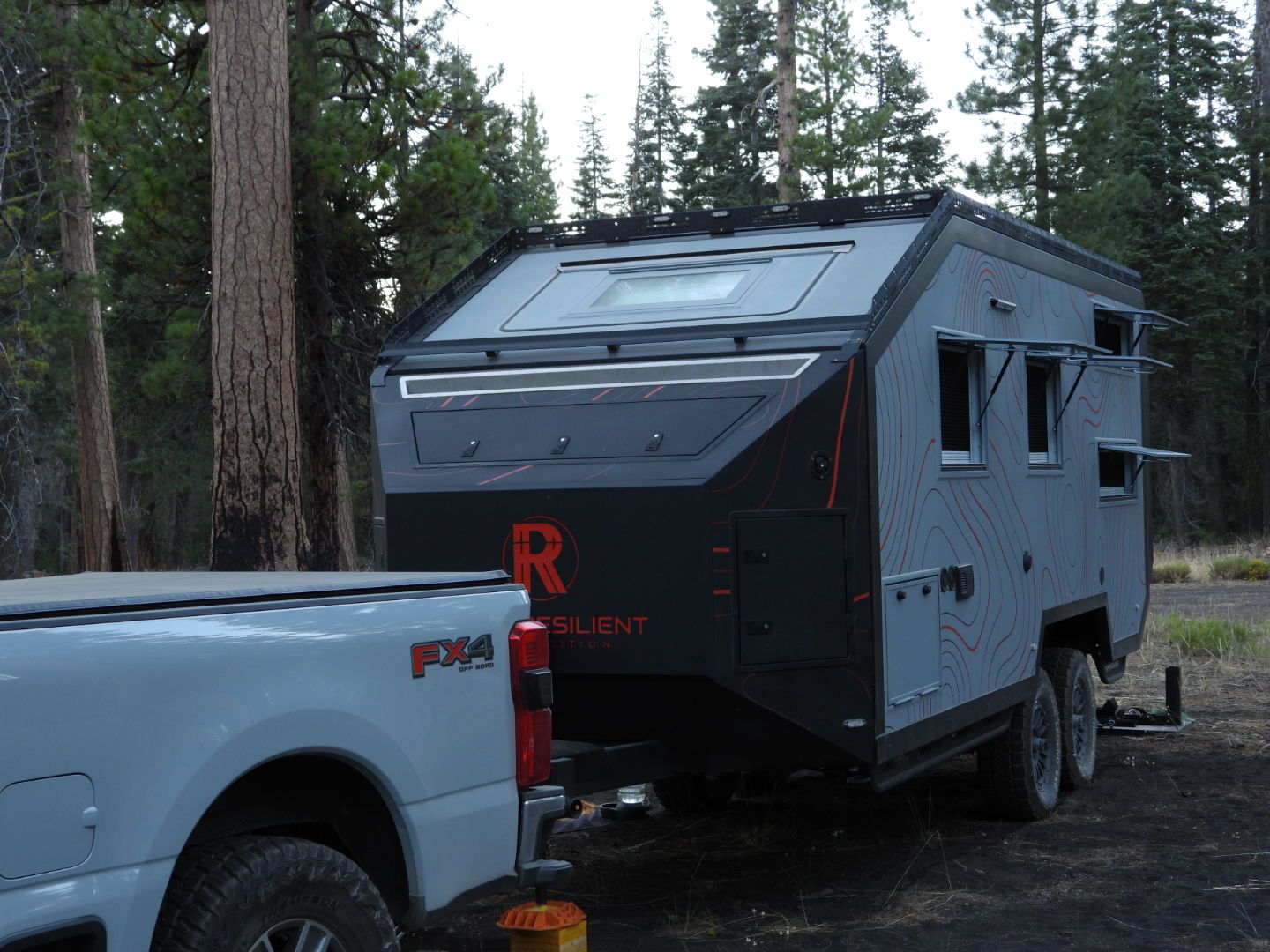 Baja Edition Bunk hitched to a Ford F-250 FX4 at a dispersed forest campsite